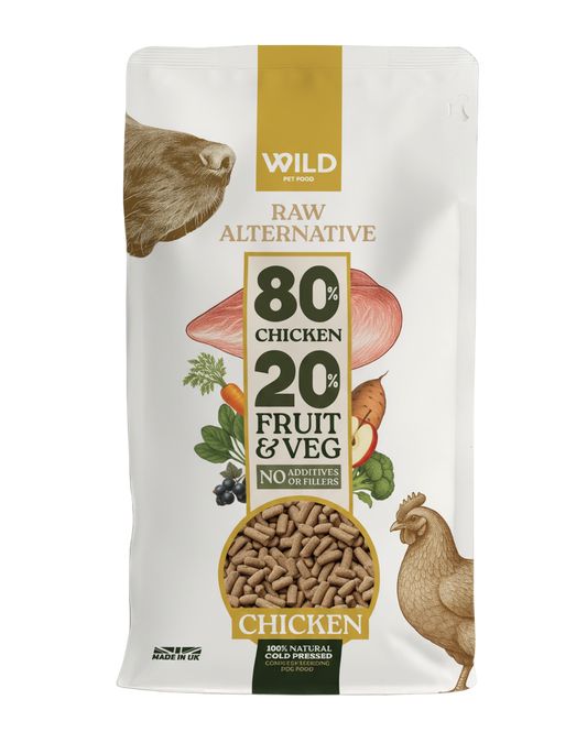 Package of Wild Pet Food raw alternative with chicken, fruit, and vegetables on a white background
