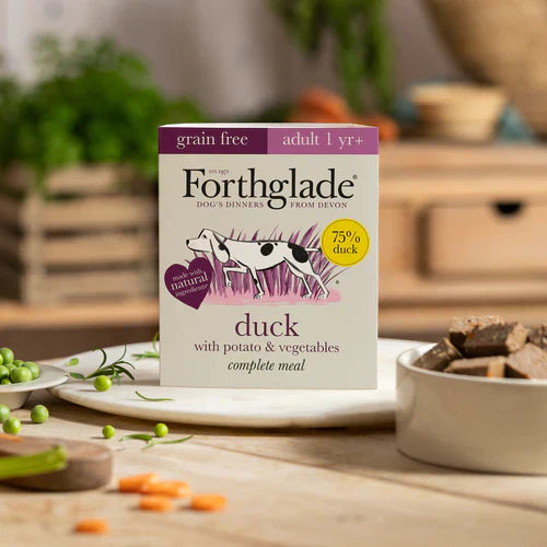 Forthglade Duck Complete dog food pack displayed in a nature-inspired outdoor setting, representing its wholesome and natural qualities.