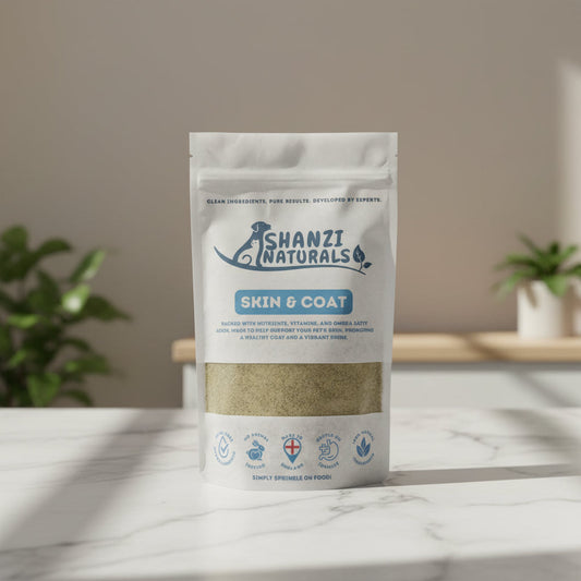 Shanzi Naturals Skin & Coat product packaging on a wooden surface with a gray background