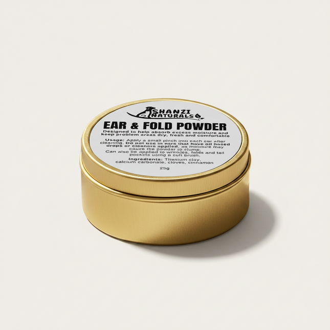 Shanzi Naturals ear and fold powder container on a beige background