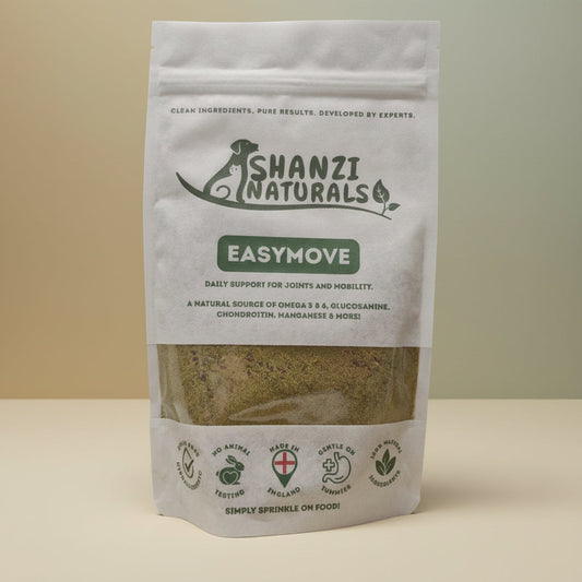 Shanzi Naturals Easymove product packaging on a wooden surface with plants in the background