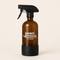 Brown spray bottle with black nozzle labeled 'Shanzi Naturals' on a beige background