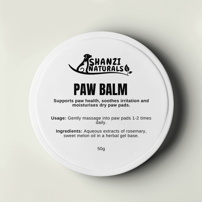 Shanzi Naturals Paw Balm container with text on a light gray background
