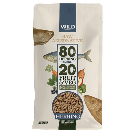 Dog food package with herring and vegetable graphics on a white background